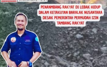 Ketua Umum Baralak Nusantara, Yudistira, dengan latar tambang batu bara, menyerukan desakan agar pemerintah mempermudah izin tambang rakyat di Lebak.